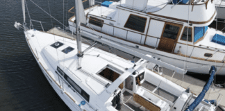 This 2016 Beneteau Oceanis 35.1 has a broad, flat stern and narrow, pointed bow. While this triangular design can offer more interior space and faster speeds, sailors need to ensure the boat isn't overloaded. Photo courtesy of Boat Trader.